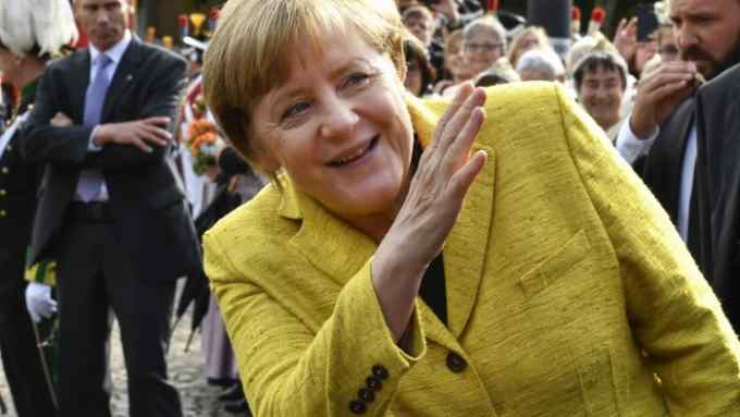 German Chancelor and head of German Christian Democratic Union CDU Angela Merkel waves during the celebrations for German Finance Minister Wolfgang Schaeuble's 75th birthday in Offenburg, southwestern Germany, on September 18, 2017. / AFP PHOTO / THOMAS KIENZLETHOMAS KIENZLE/AFP/Getty Images