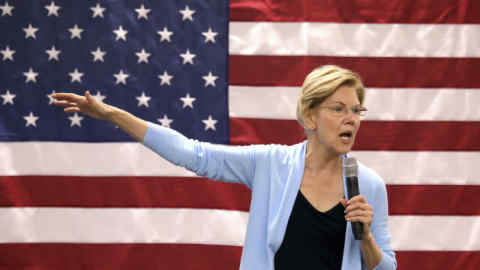 Democratic presidential candidate Sen. Elizabeth Warren, D-Mass., speaks during a town hall campaign stop at Custom Training Solutions in Toledo, Ohio, on Monday, July 29, 2019. The visit comes a day before her appearance in the Democratic Party primary debate in Detroit. (Kurt Steiss/The Blade via AP)