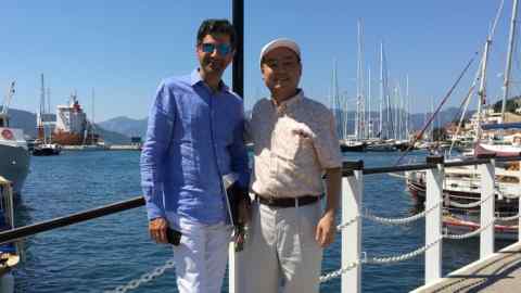 Softbank founder Masayoshi Son with Alok Sama, chief finance officer, in Marmaris, Turkey on July 3.&lt;/span&gt;