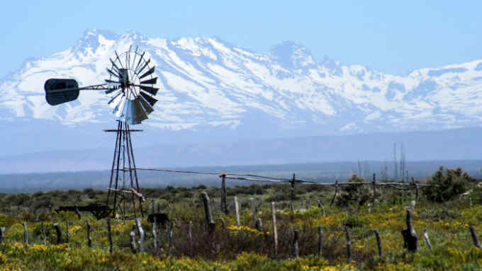 Abandoned farm near Mendoza in Argentina with Andes in the background