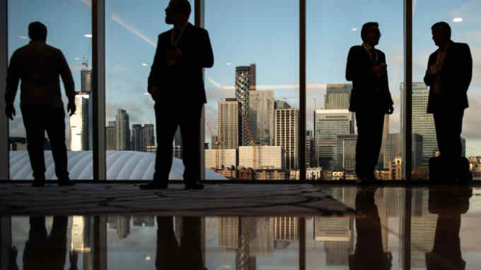 LONDON, ENGLAND - NOVEMBER 18: The Canary Wharf financial district is seen in the background as delegates and business leaders network at the annual CBI conference on November 18, 2019 in London, England. With 24 days to go until the general election, each of the leaders of the three main parties addressed the conference, in a bid to garner the support of the business sector. (Photo by Leon Neal/Getty Images)