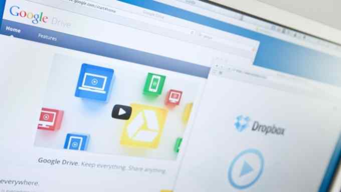&quot;Belluno, Italy - May 3, 2012: Google has opened its online drive &quot;&quot;Google Drive&quot;&quot;. Home users and businesses to store up to five gigabytes of data for free, for a larger capacity is paid a monthly fee. Dropbox is a Web-based file hosting service operated by Dropbox.&quot;