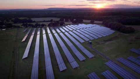 File photo dated 06/08/16 of solar panels in a field near Five Oaks, west Sussex. A third of the UK's electricity came from renewables in 2018 as overall power generation fell to its lowest levels since 1994, analysis shows.