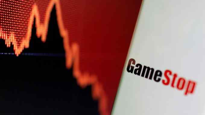 GameStop logo is seen near displayed stock graph in this illustration