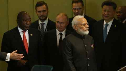 South Africa’s Cyril Ramaphosa, Russia’s Vladimir Putin,  India’s Narendra Modi, and Xi Jinping of China attend the Brics Summit in Brasilia in 2019