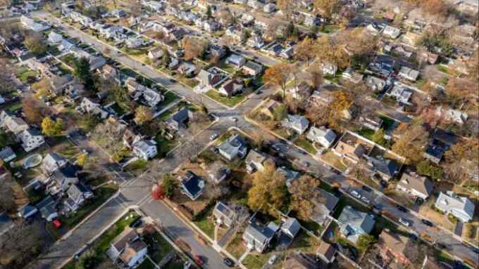 Aerial view of American suburban housing on streets in grid pattern