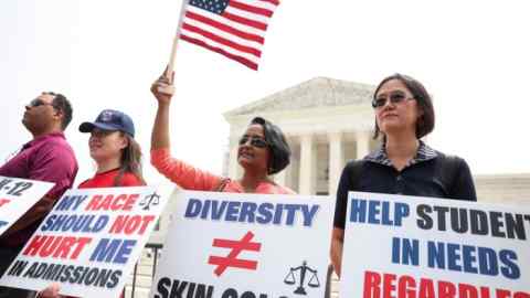Demonstrators in Washington respond to the US Supreme Court decision to strike down race-conscious student admissions programmes on June 29