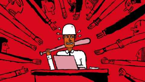 An illustration of a man at his ‘hot’ desk, with a baseball bat in hand and wearing a hardhat