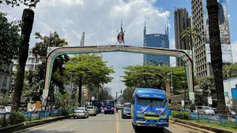 Traffic flows along Kenyatta avenue in downtown Nairobi, Kenya