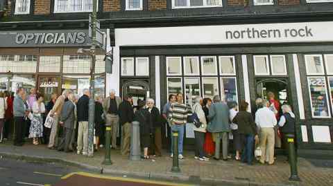 Customers queue to enter a Northern Rock branch in Bromley, south-east London, in September 2007