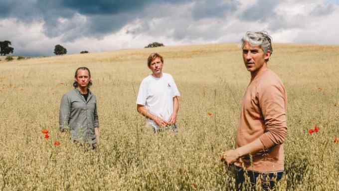 George Lamb, Andy Cato and Edd Lees, co-founders of Wildfarmed, on Colleymore Farm, Coleshill