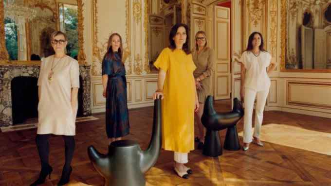 From left: Grela Orihuela, Design Miami senior VP for fairs, Johanna Grospiron, gallery and collector liaison, Europe, Jen Roberts, CEO, Nicole Darnell, VP for global production and Soraya Chaar, Design Miami/Paris project manager, at L’hôtel de Maisons in Paris, with Rinoceronte stool, €17,000, and Cuerna stool, €16,000, both by Abel Cárcamo, from Galerie Scène Ouverte