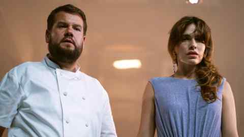 James Corden and Melia Kreiling stand side by side