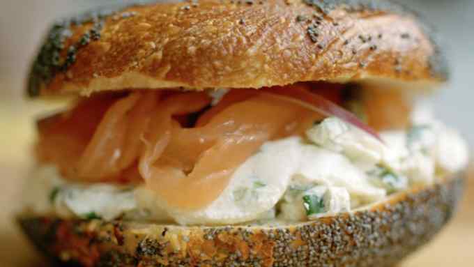 A poppy-seed bagel with The Works (schmear, lox, red onions and capers)