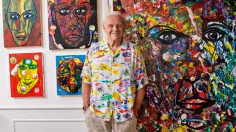 Anthony Hopkins in the studio at his Malibu home with his own artworks