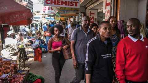 People mingle in a Nairobi market