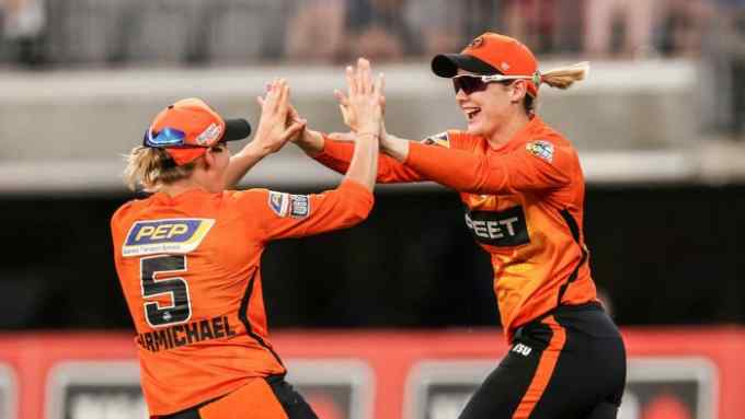 Lilly Mills of the Scorchers celebrates after taking a catch to dismiss Bridget Patterson of the Strikers during the Women’s Big Bash League Final match between the Perth Scorchers and the Adelaide Strikers at Optus Stadium, on November 27, 2021, in Perth, Australia
