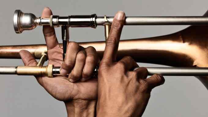 Troy “Trombone Shorty” Andrews’s hands on a trombone