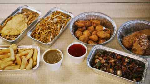 chop suey, chow mein, pork balls, crispy pancake rolls, chips and curry sauce
