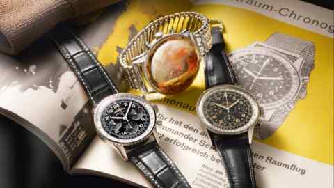 From left: the limited-edition Breitling Navitimer Cosmonaute, £8,400, the model Scott Carpenter wore to space, and a 1962 Navitimer Cosmonaute