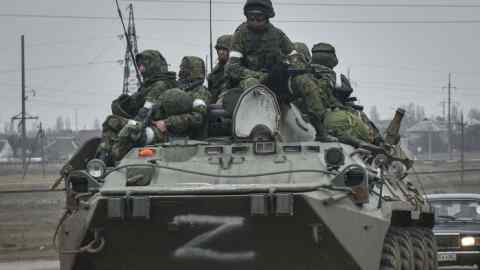 Russian troops in an armoured personnel carrier in Crimea in February 2022
