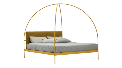A bed with curved posts forming an arc