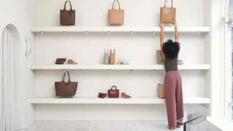 Yvonne Koné and a selection of bags from her current collection