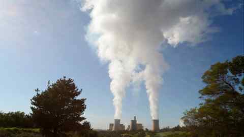 Steam billows from the cooling towers of the coal-fired power station operated by EnergyAustralia Holdings, in the Latrobe Valley, Australia