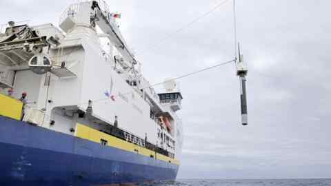 A vessel deploys a robotic data-gathering gadget