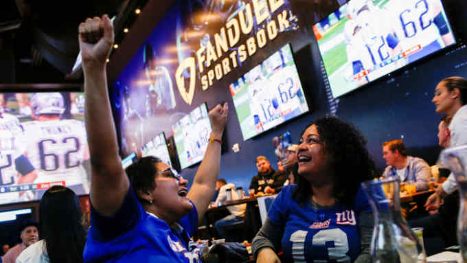 Gamblers in New Jersey, US, place bets during the 2019 Super Bowl