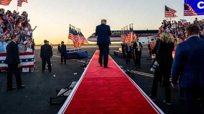 Former US President Donald Trump exits after speaking during a rally at the Waco Regional Airport