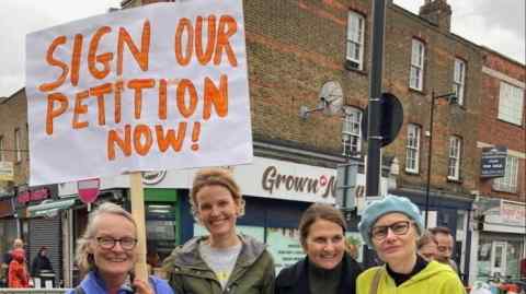 A groupof people petitioning Islington council to change planning rules