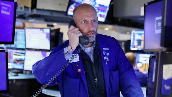 A trader on the trading floor at the New York Stock Exchange