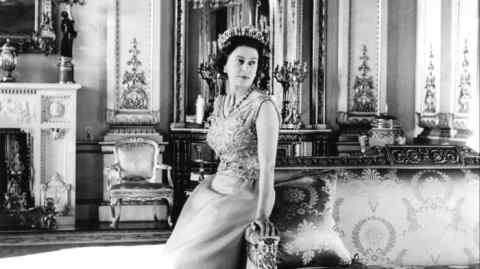 HM Queen Elizabeth II photographed by Cecil Beaton in the White Drawing Room at Buckingham Palace
