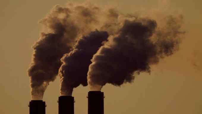 Emissions rise from smokestacks