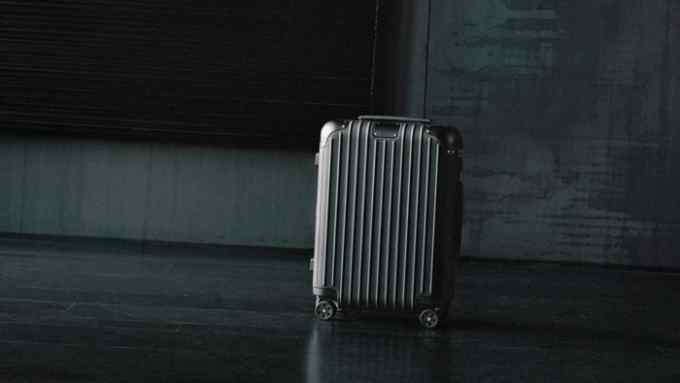 Rimowa leather-wrapped aluminium Distinct suitcase, £2,530