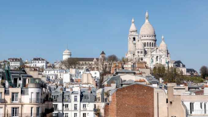 A view of Pigalle and the Sacré-Coeur Basilica from the Hôtel Rochechouart
