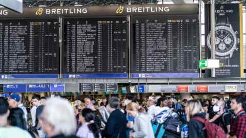 Flight information boards display cancelled flights in the departures hall at Terminal 1 of Frankfurt Airport