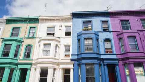 A row of multicoloured terraced houses in London’s Notting Hill