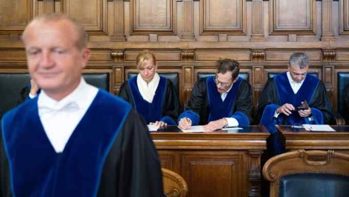 Four judges inside an appeal court