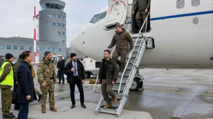 Ukrainian President Volodymyr Zelenskyy steps off a plane
