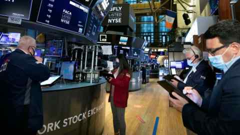 Traders on the New York Stock Exchange floor