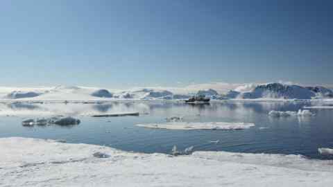 The NWS yacht RV Kinfish sails among icebergs in Svalbard/A herd of elephants in Sri Lanka