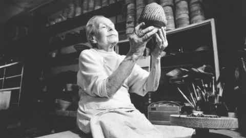 Lucie Rie in her studio at Albion Mews in the 1990s