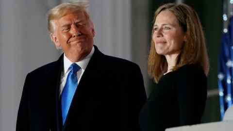 President Donald Trump with Amy Coney Barrett after she was sworn in to the Supreme Court. The court may not be elected, but it does count on its perceived legitimacy
