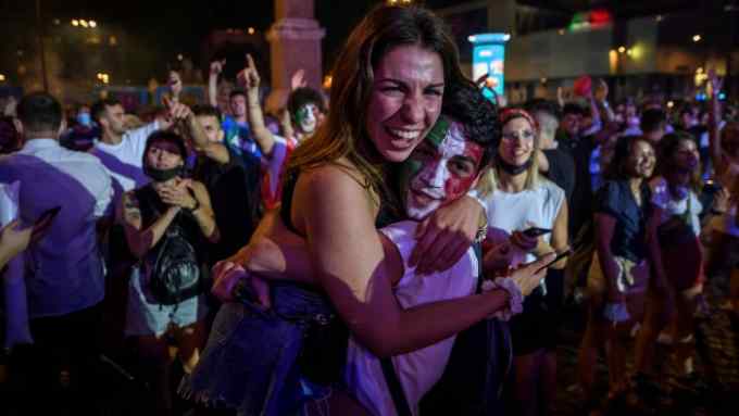 Italian fans in Rome celebrate the victory of their team after the Euro 2020 Final match at Wembley Stadium on Sunday