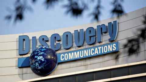 Signage is displayed on the exterior of Discovery Communications Inc. headquarters in Silver Spring, Maryland,