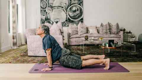 Deepak Chopra practising yoga at home in Manhattan