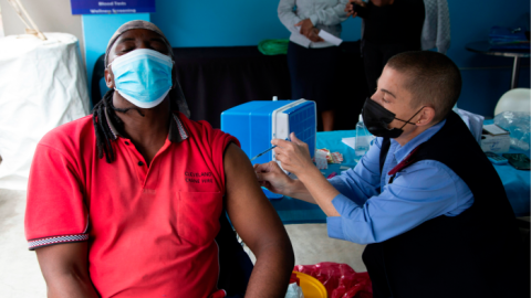 A man gets vaccinated against Covid-19 at a site near Johannesburg, South Africa