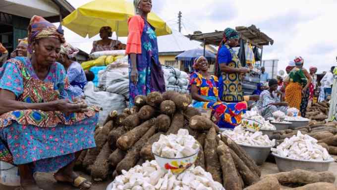 Yams and cassava for sale at a market in Sawla, Ghana